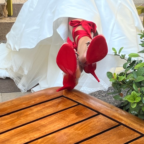 Christian Louboutin Red Heels with Bow and Silver Accents - Picture 8 of 13